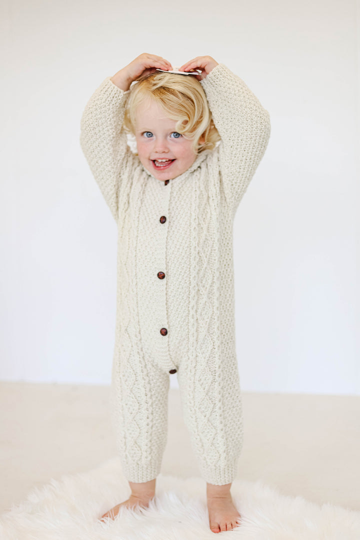 All-in-One Aran Knitted Romper in Pure Merino Wool With Hood - Hand knitted in 100% Soft Donegal Merino